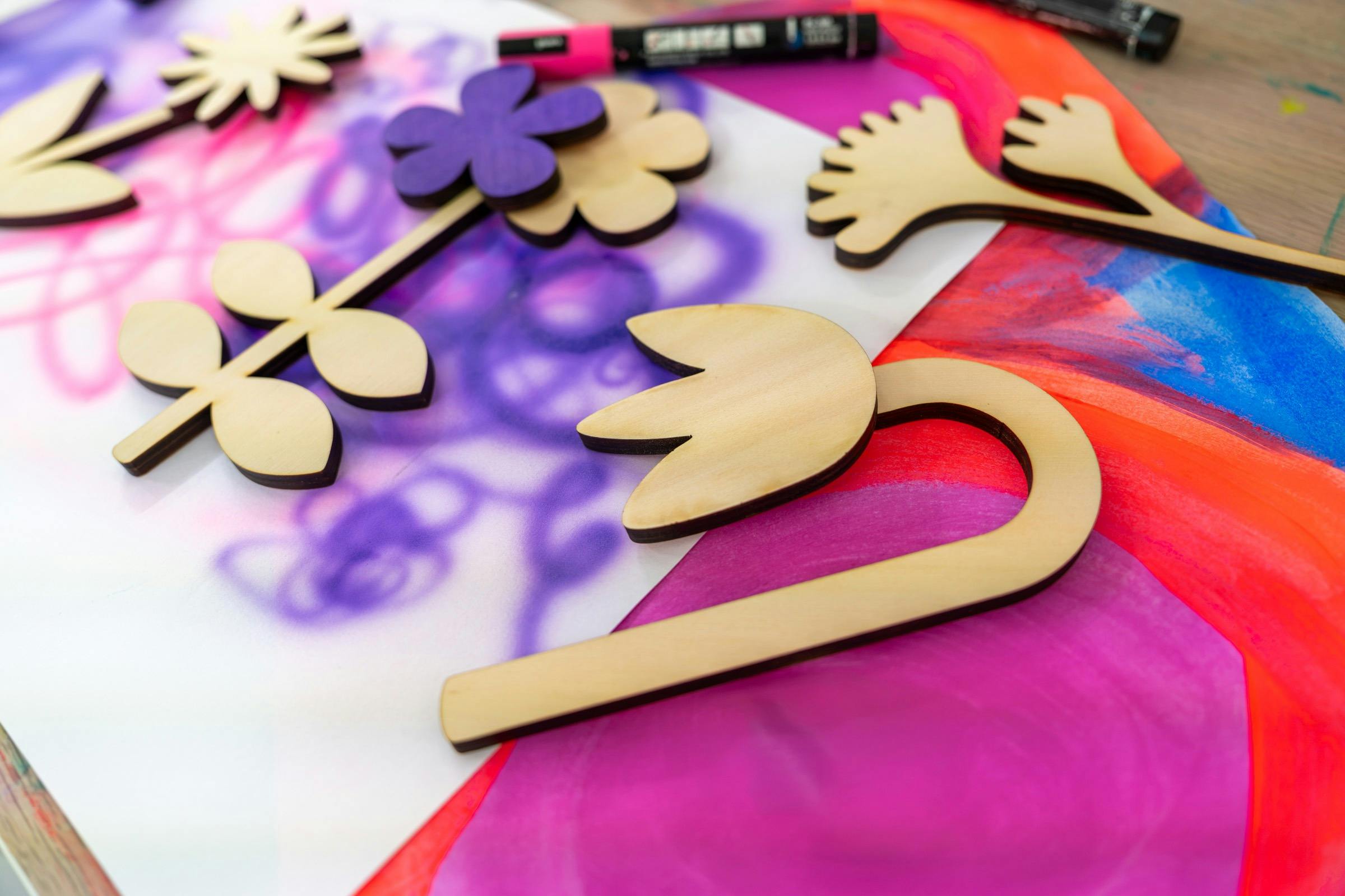 Example of workshop activity - wooden flowers ready for painting.