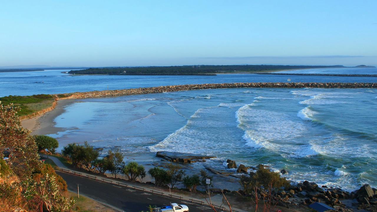 Looking down from Pilot Hill, Iluka Main Beach in the background, Iluka Bluff in the distance.