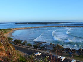 Looking down from Pilot Hill, Iluka Main Beach in the background, Iluka Bluff in the distance.