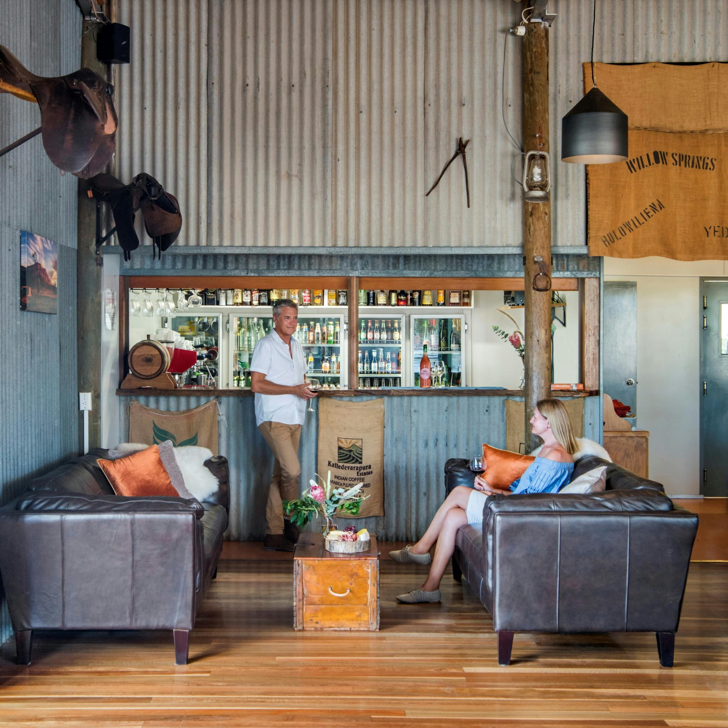 Couple relaxing in the Bar area of the Woolshed Restaurant at Rawnsley Park Station