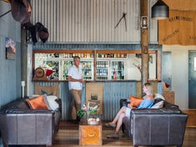 Couple relaxing in the Bar area of the Woolshed Restaurant at Rawnsley Park Station