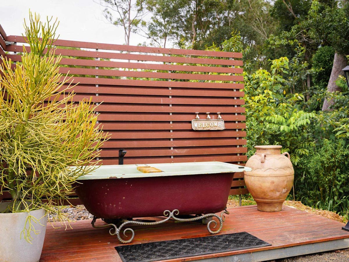 Outdoor bathtub at the hitching rail retreat, the perfect spot to relax and stargaze, north qld