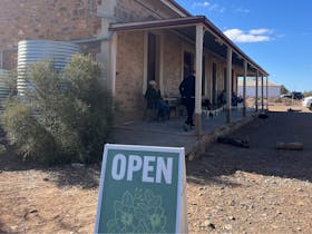 paub verandah with people sitting at tables