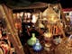 Various traditional trinkets and artistic pieces in a room with a bazaar-style appearance