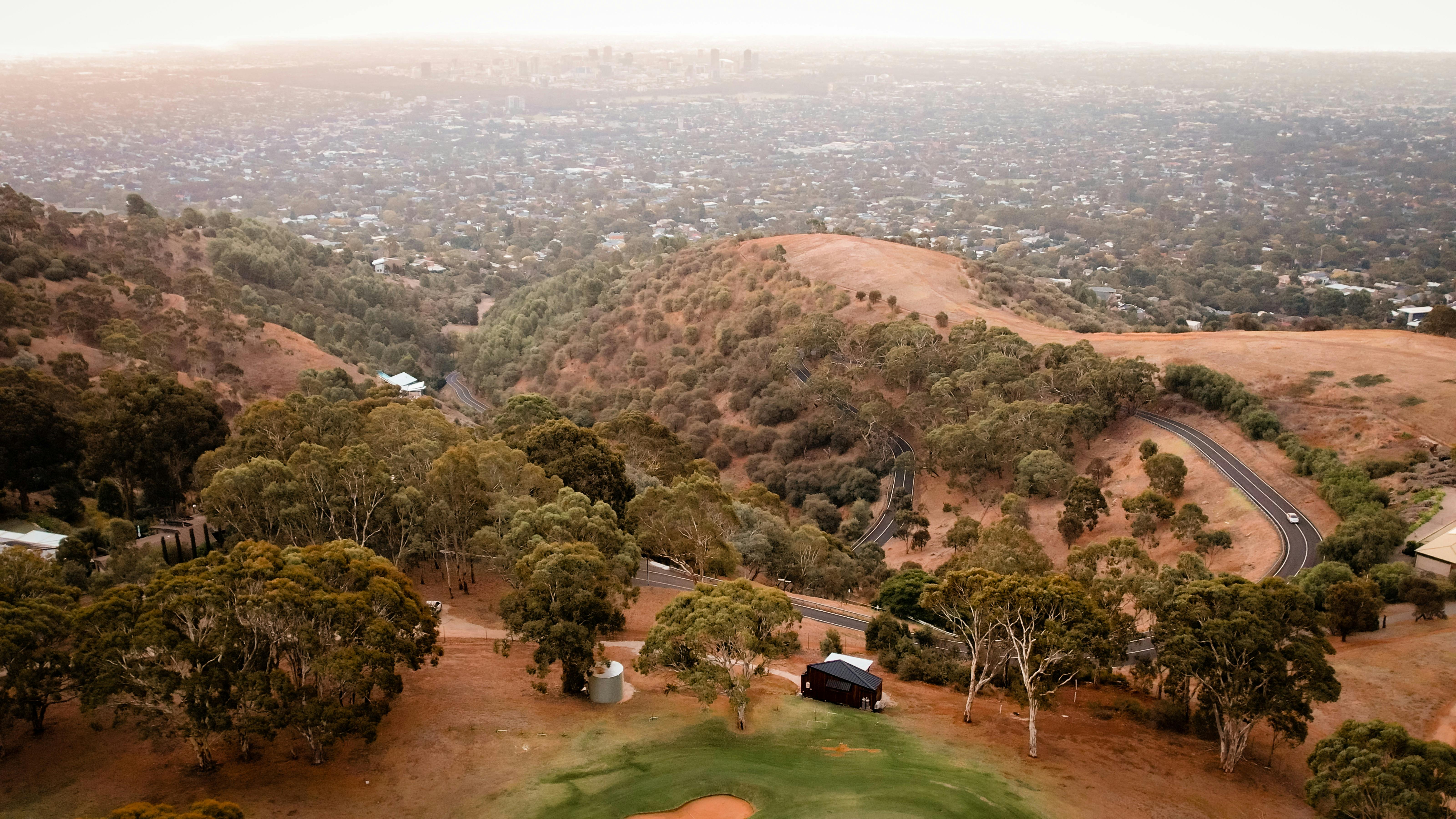 Aerial view from behind towards the city