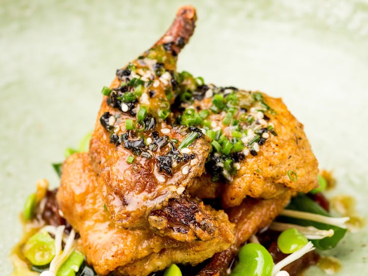 Rannock farm crispy jumbo quail, tamarind, broad beans, enoki, kombu butter