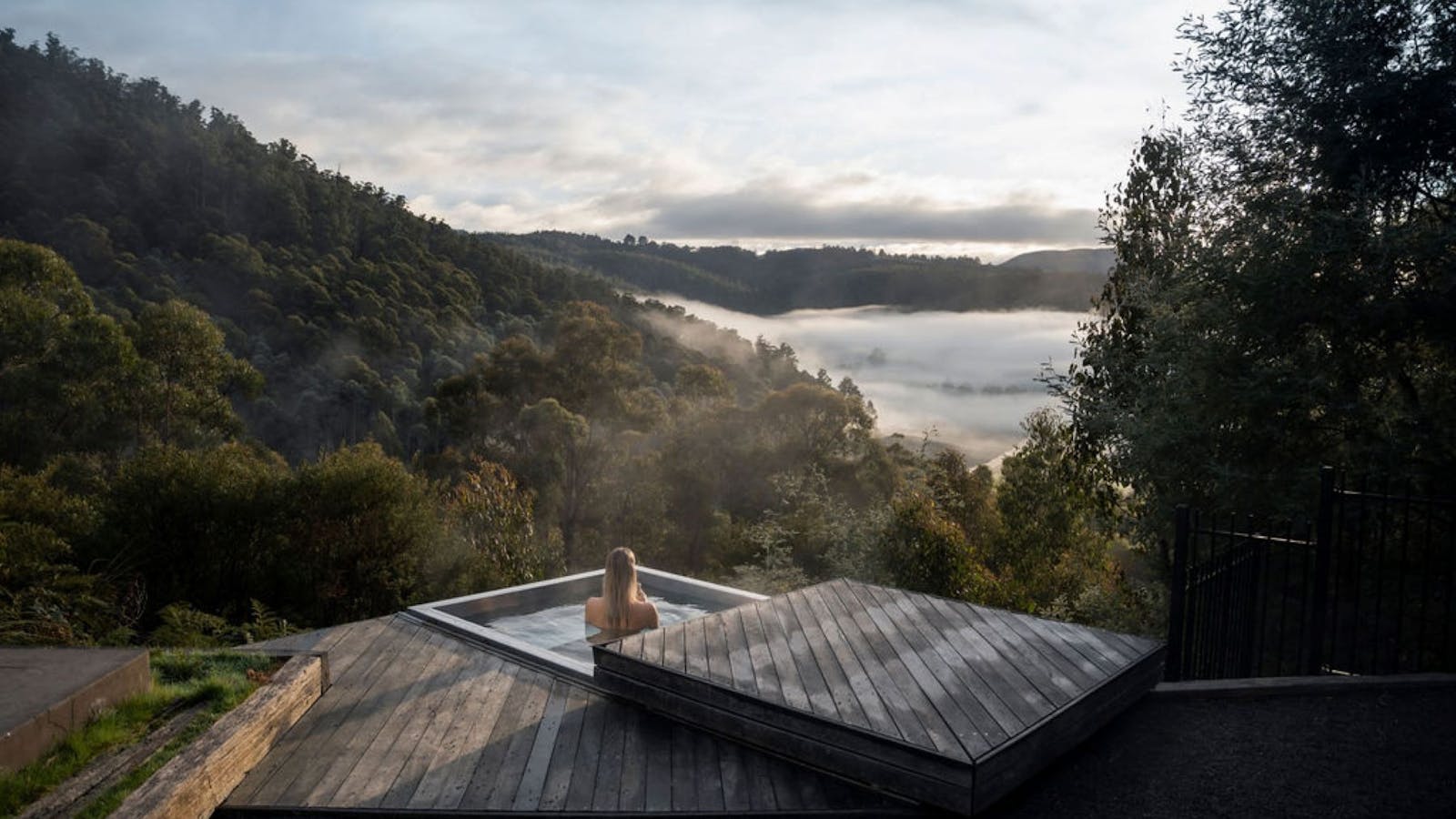 Soak away in the mineral filled hot tub perched on the side of the hill.