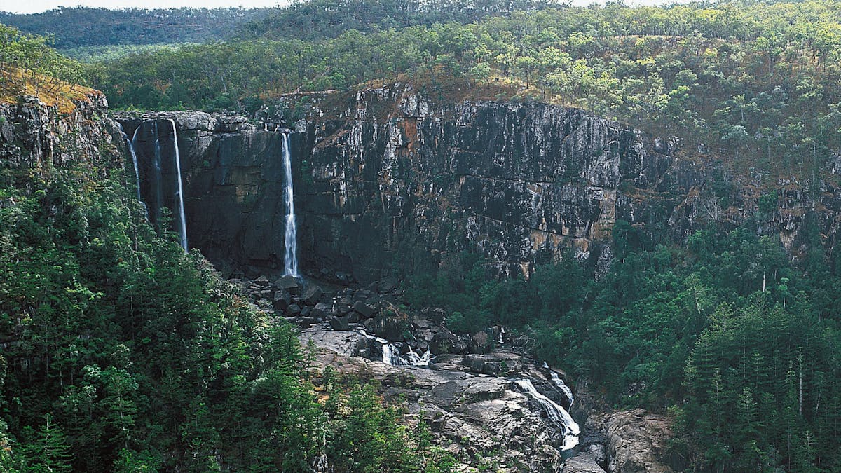 Waterfall dropping over walls of gorge, Blencoe Falls.
