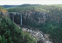 Waterfall dropping over walls of gorge, Blencoe Falls.