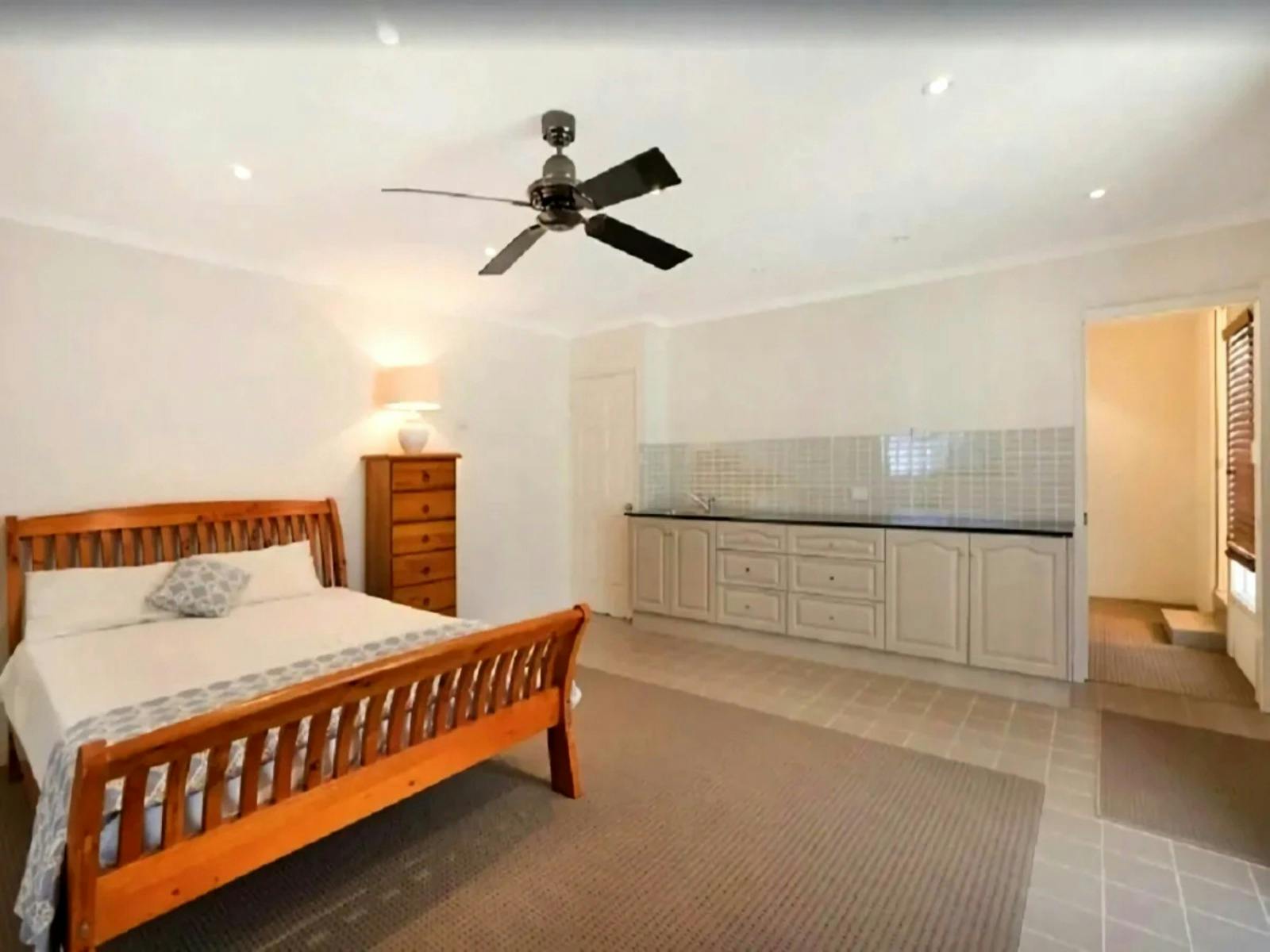 queen bed and comfortable sitting area, an ensuite bathroom