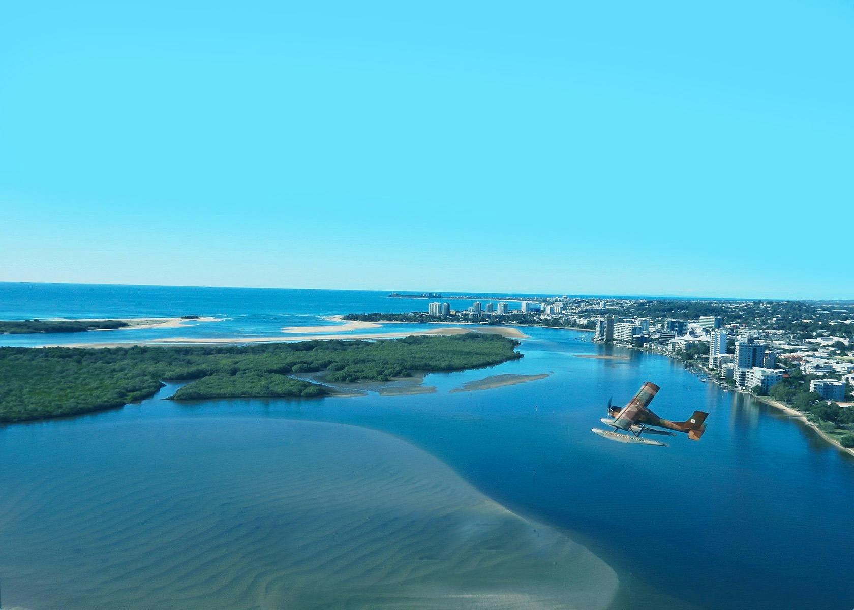 Seaplane above Goat Island with Maroochydore river mouth.