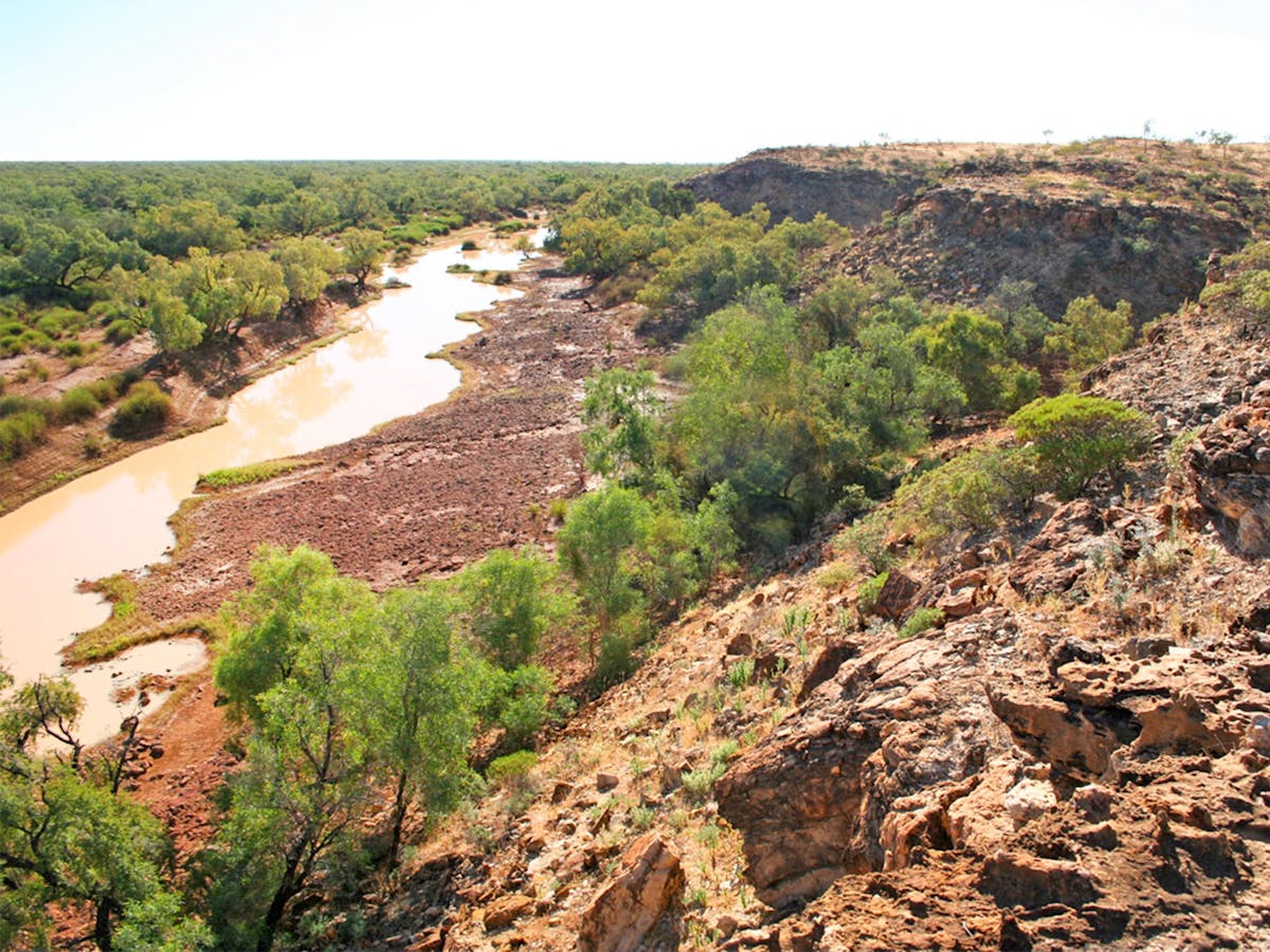 Muddy river seen from rocky outcrop. Muddy river seen from rocky outcrop.