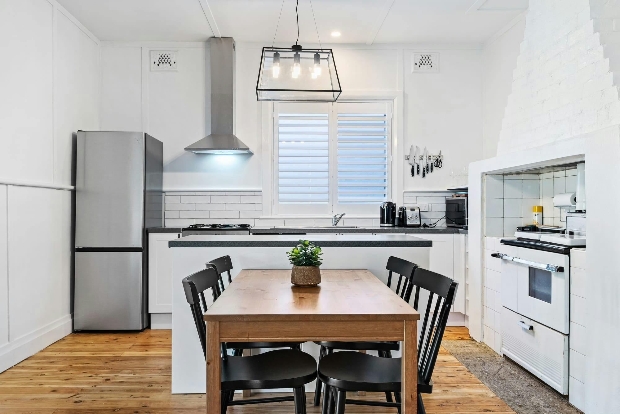 Dining table and chairs for 4 guests