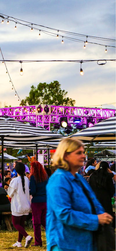 People enjoying food and drink in the Festival Hub