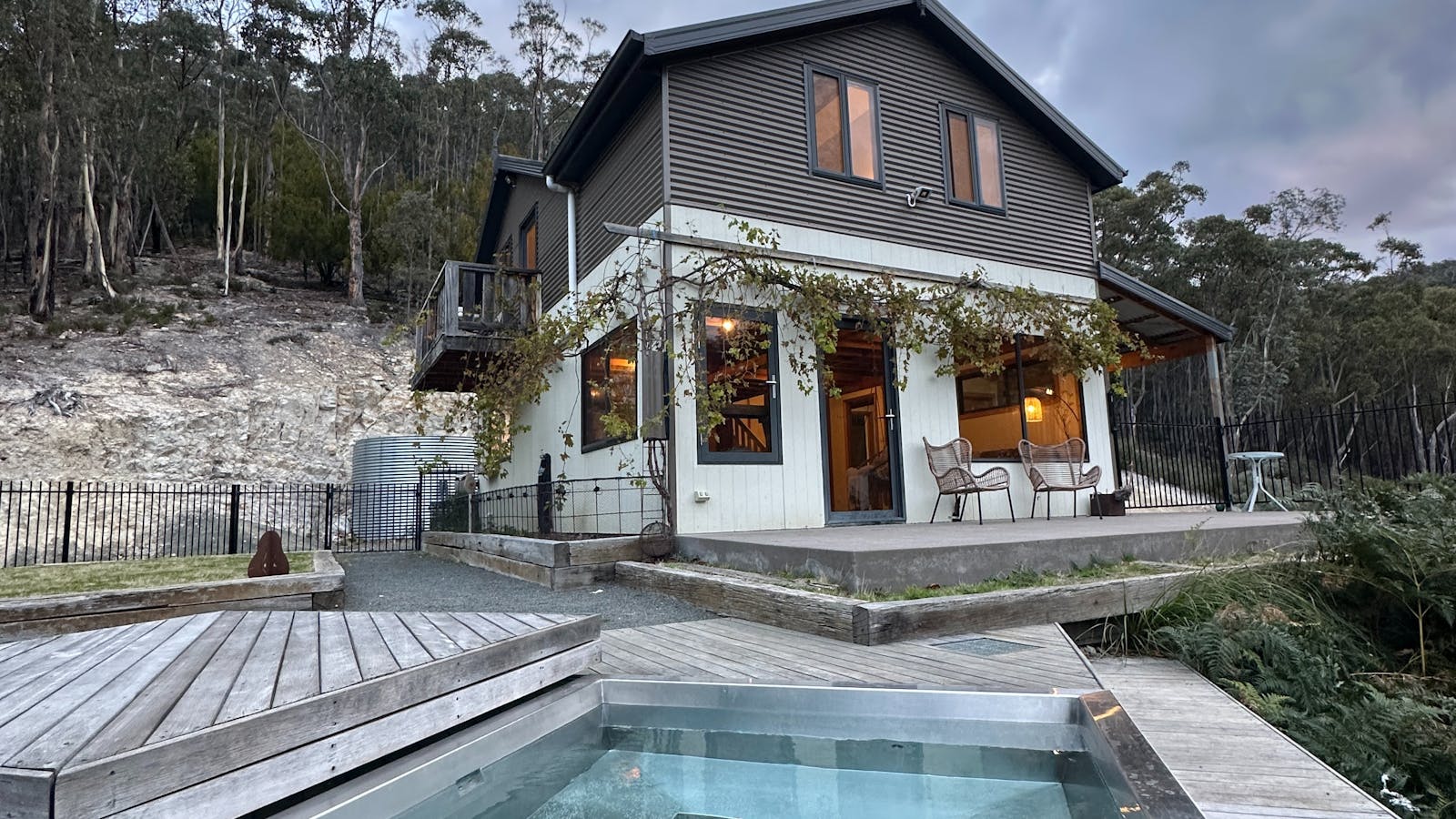 The custom made thermal spa has a timber cover that slides back to reveal the constantly warm spa