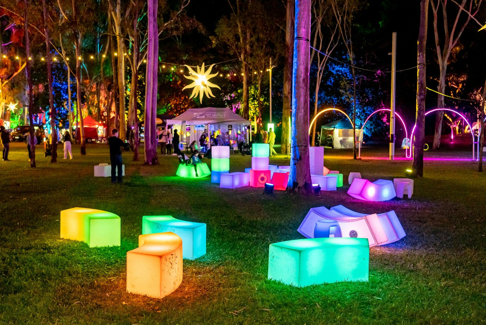 Glowing furniture in the Gardens at night