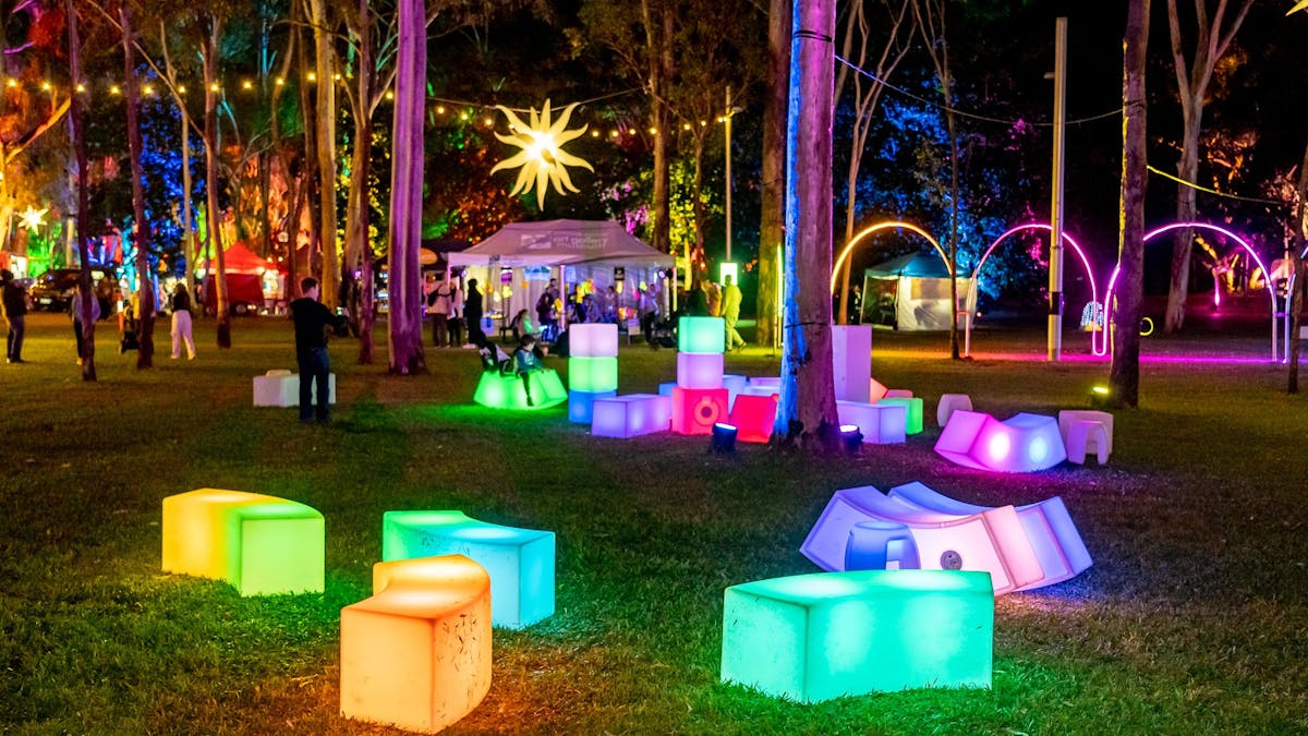 Glowing furniture in the Gardens at night