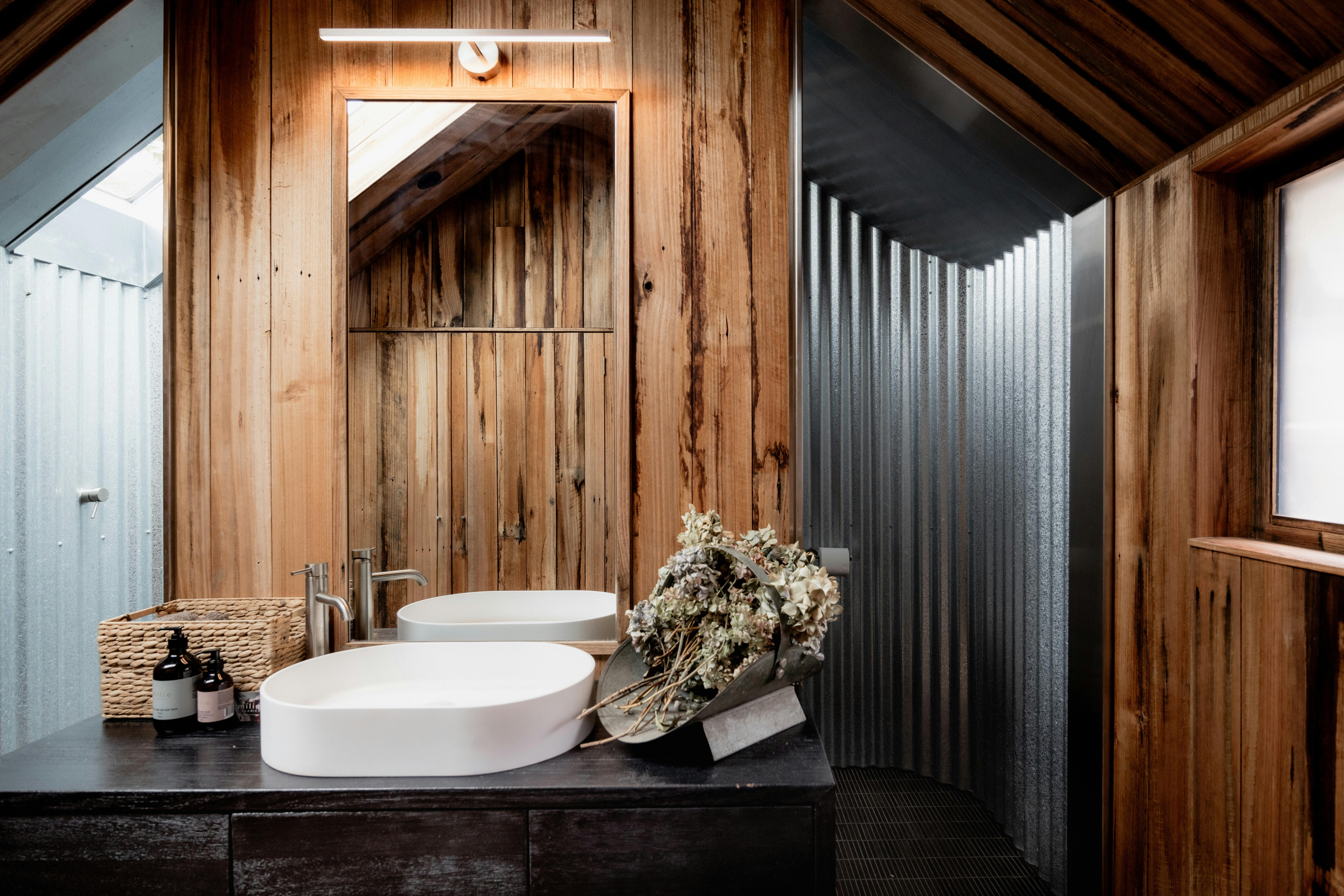 Bask in the rustically renovated bathrooms with generous skylights to bring the landscape to you