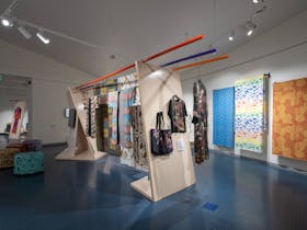 display of contemporary colourful clothes adn textiles