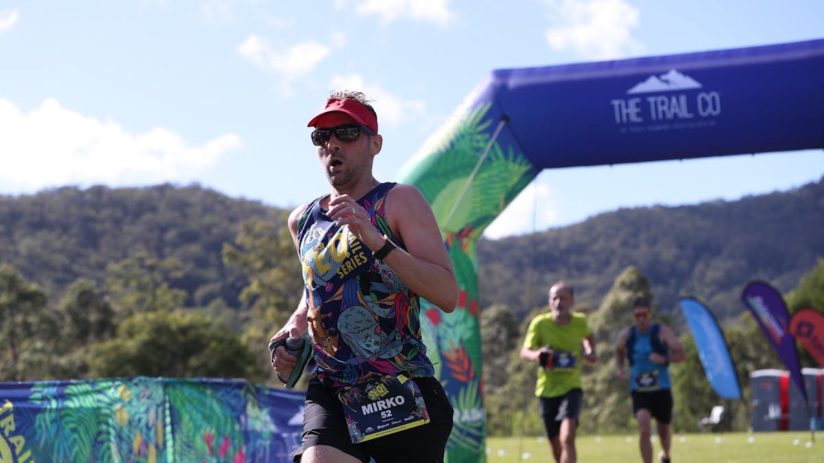 Trail runner at finish line