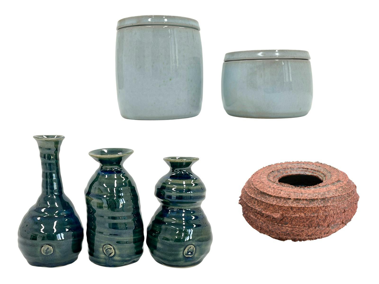 various ceramic pieces - canisters, bottles, vase