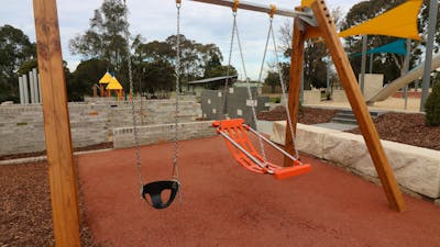 Swing set with disability chair