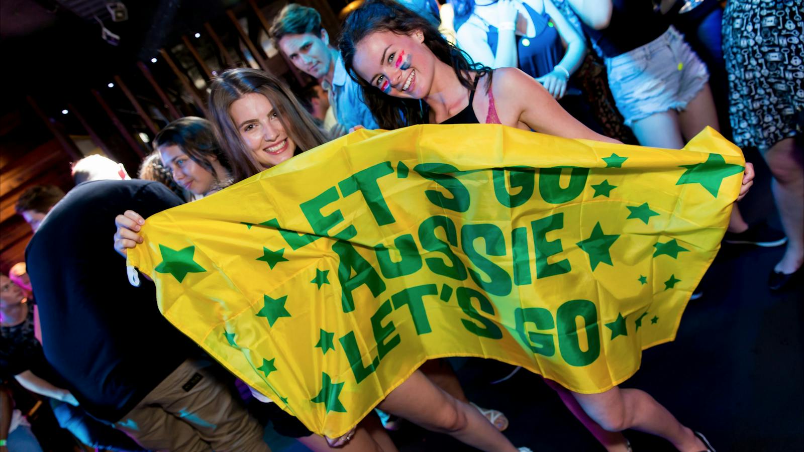 Aussie Girls holding flag