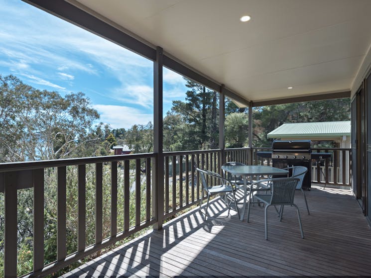Each cottage has its own veranda, perfect for outdoor meals and looking out to the lake.