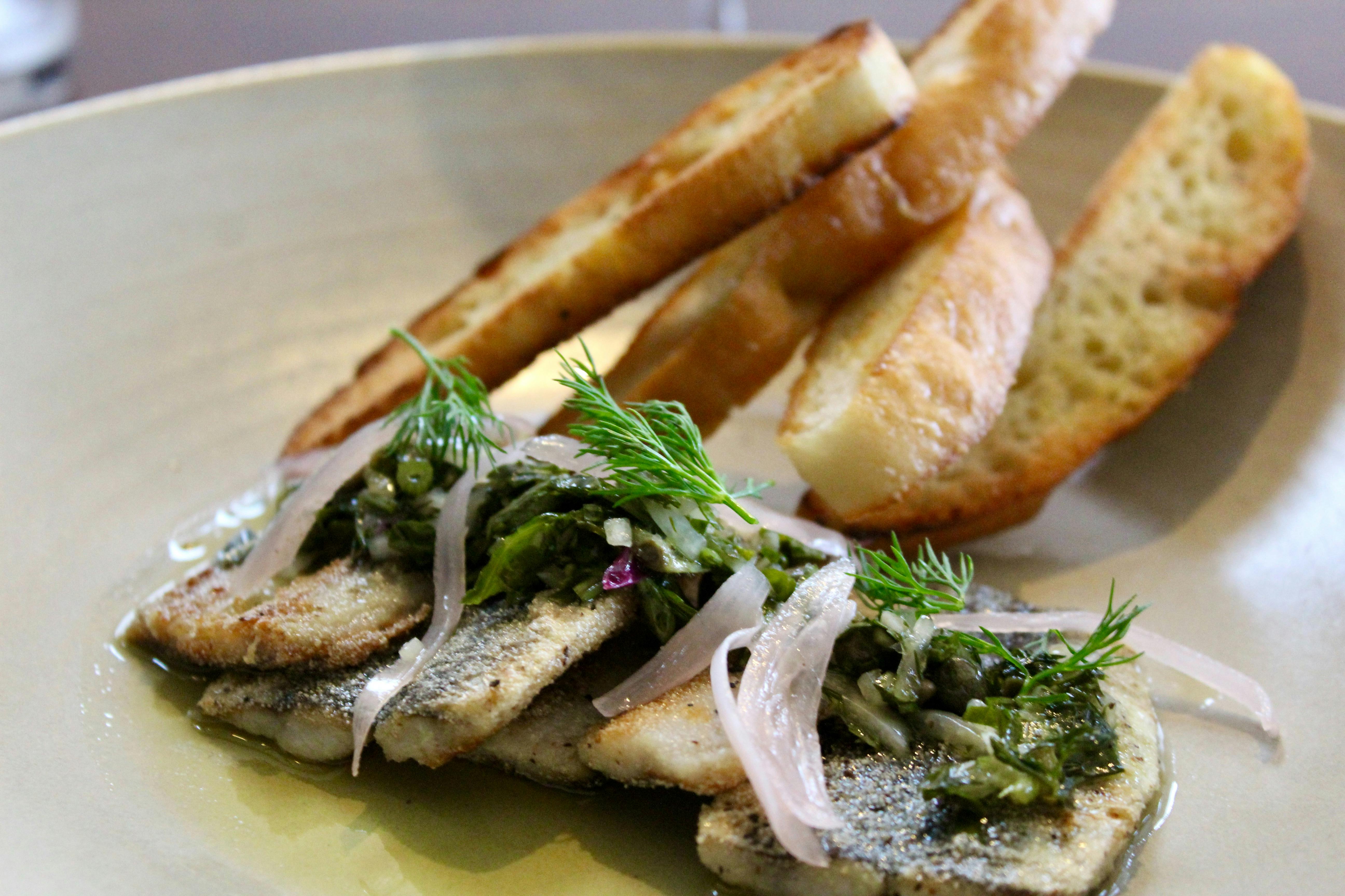 Grilled with a salsa verde, crispy ciabatta & pickled shallot