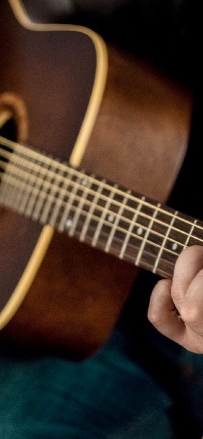 Man playing acoustic guitar