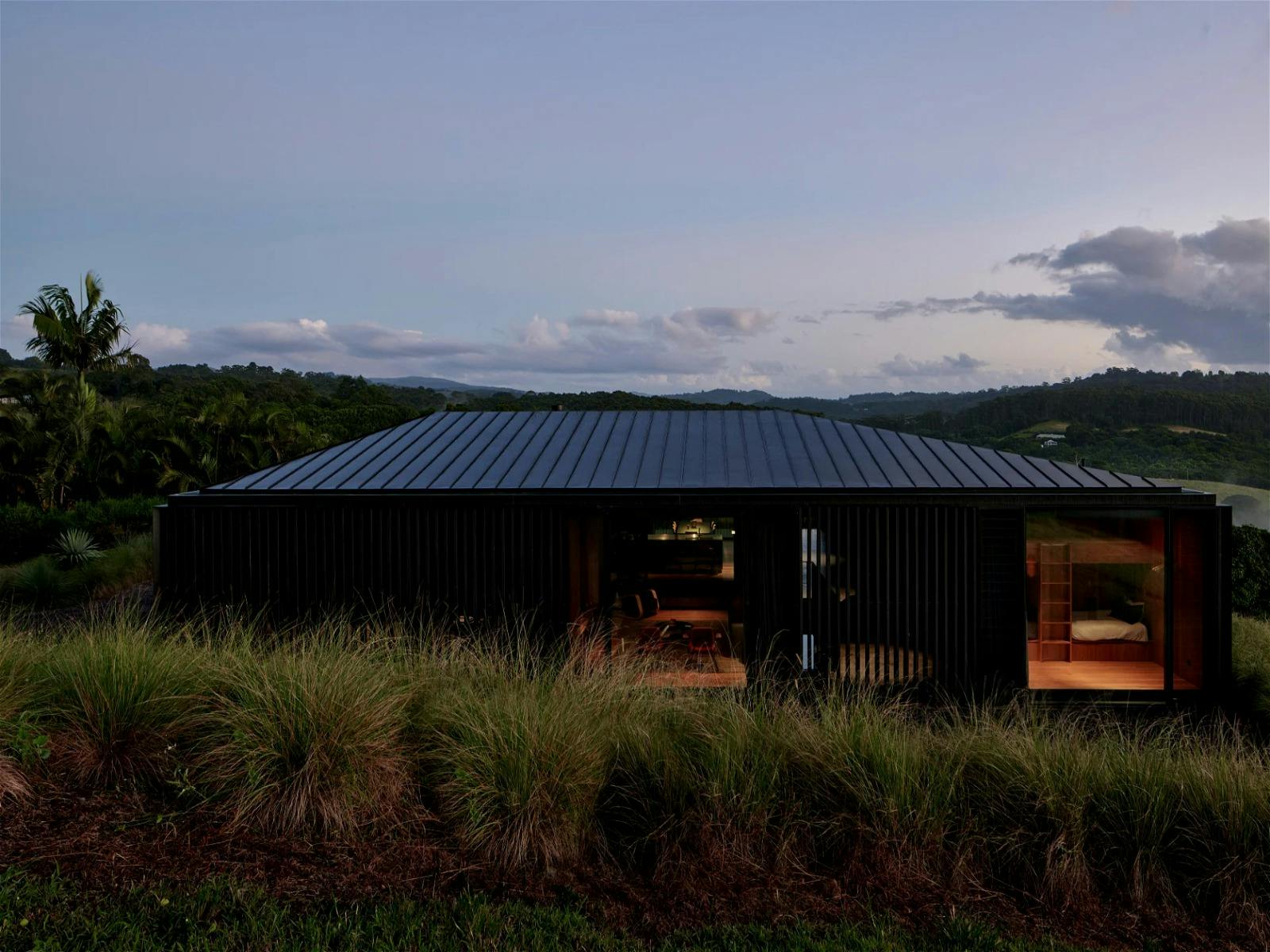 Breathtaking fusion of contemporary modern living and the lush sub-tropical forest surrounding it