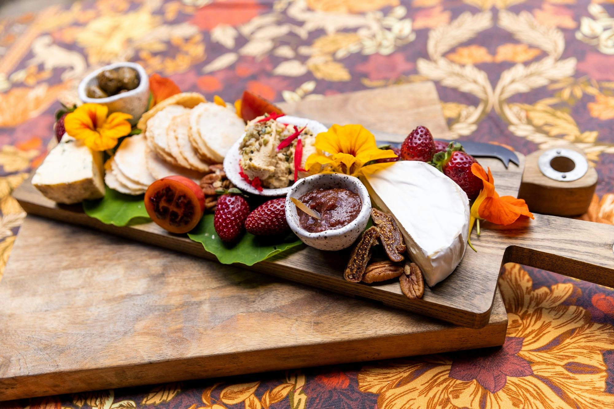 Nightfall welcome platter of organic food and edible flowers from the onsite garden.