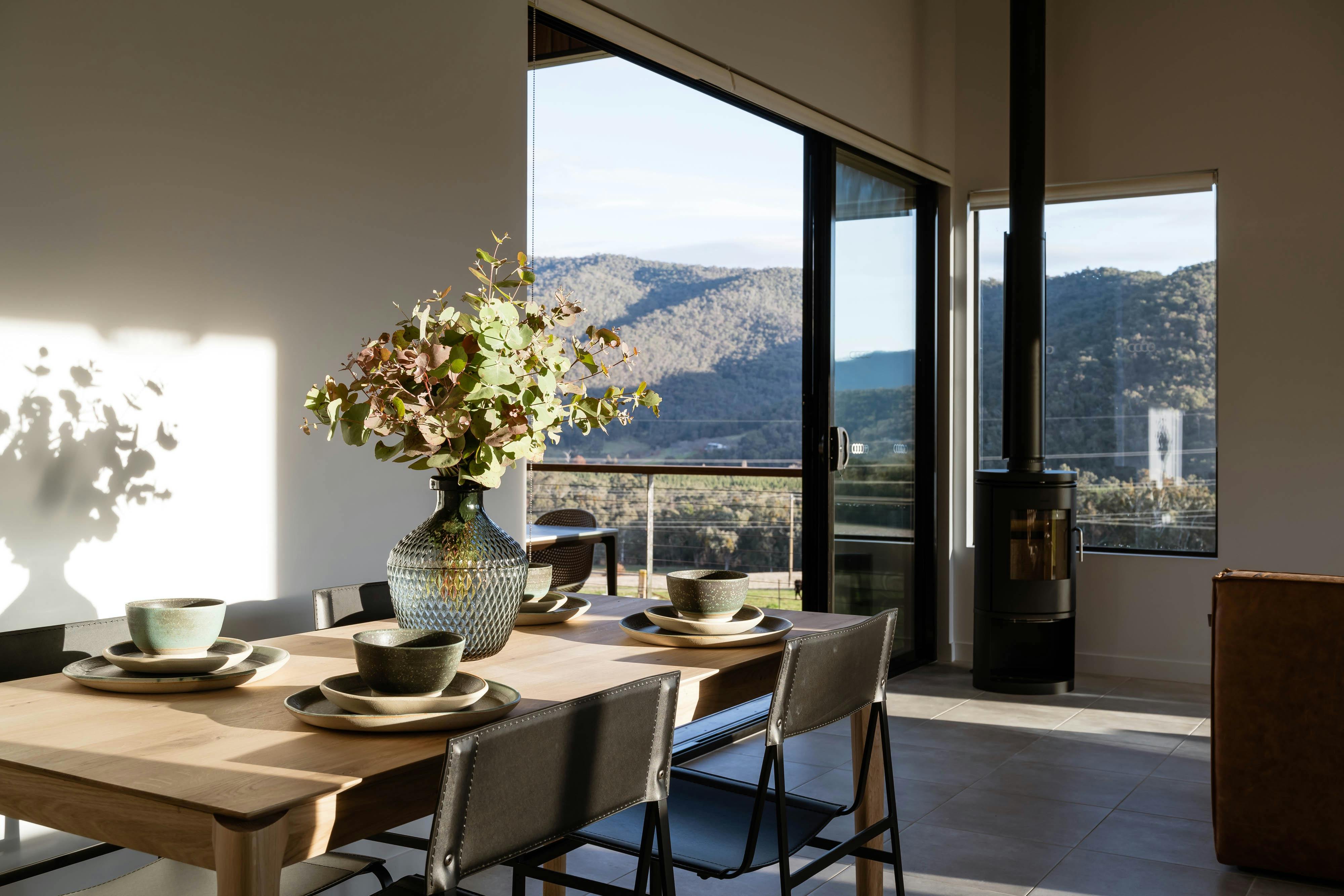Dining table with beautiful local pottery and views