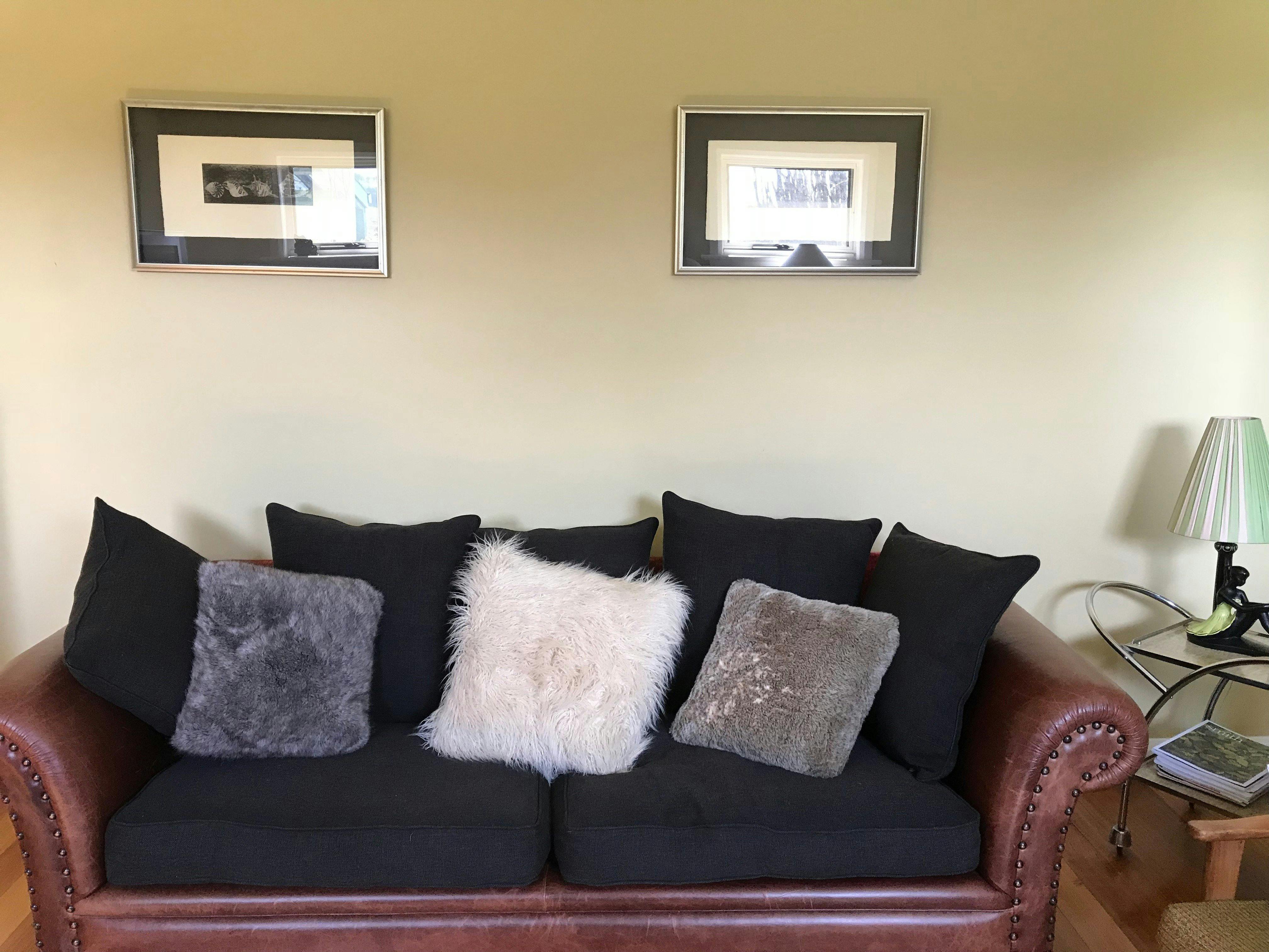 A large comfortable couch in the separate lounge