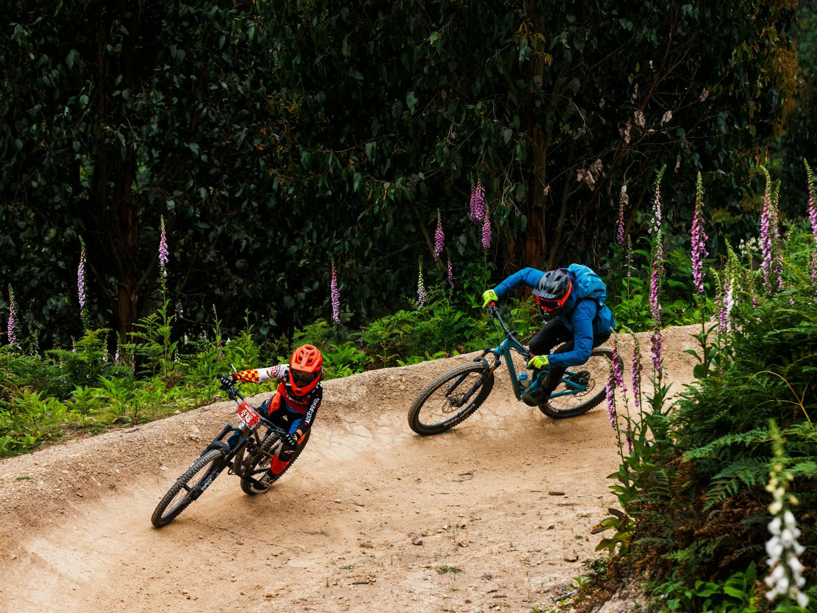 Riders at Maydena Bike Park in beginner racing segments