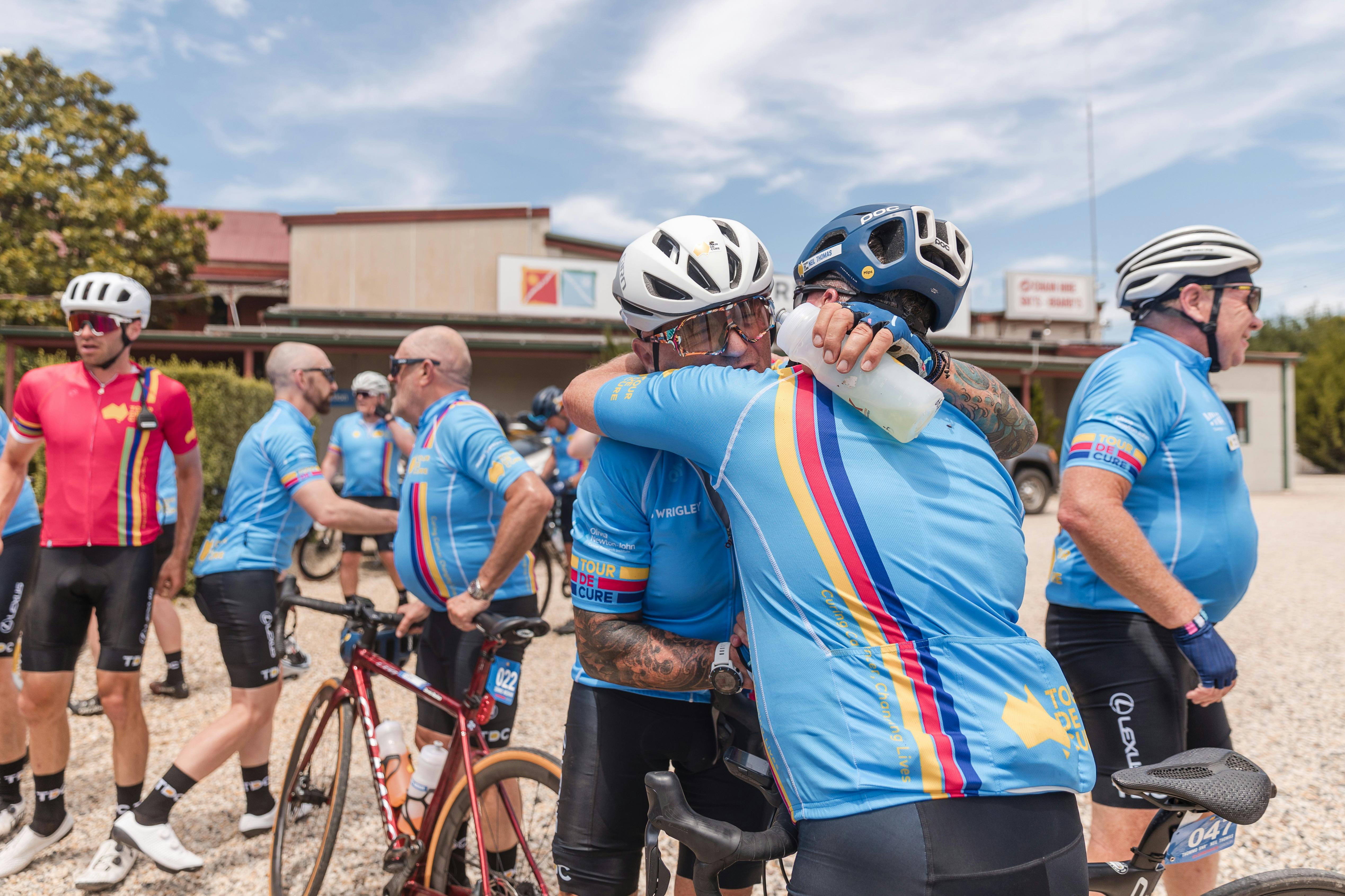 Riders embrace