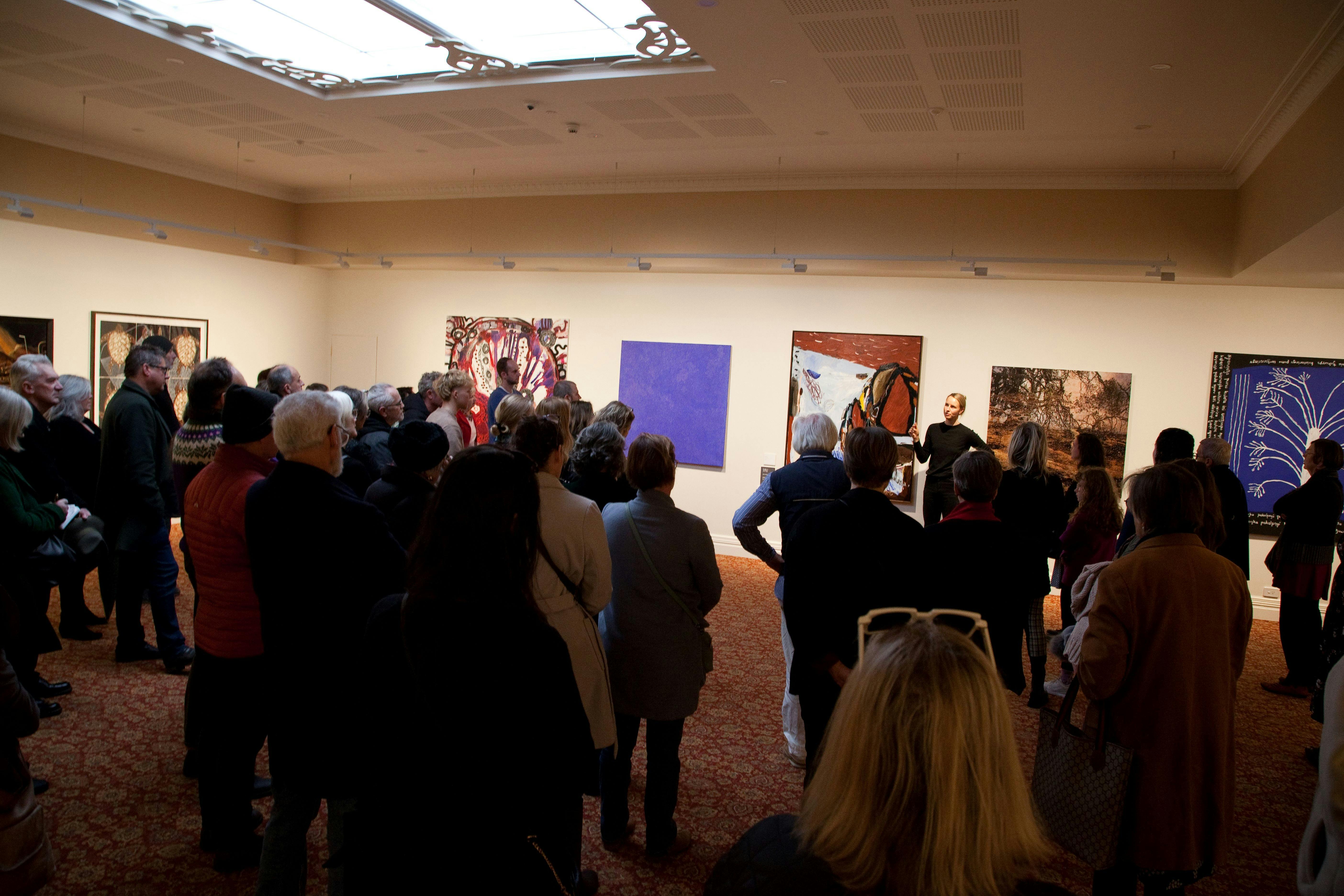 2024 winner Zoe Grey giving an artist talk in front of her work in the Hadley's Art Prize gallery