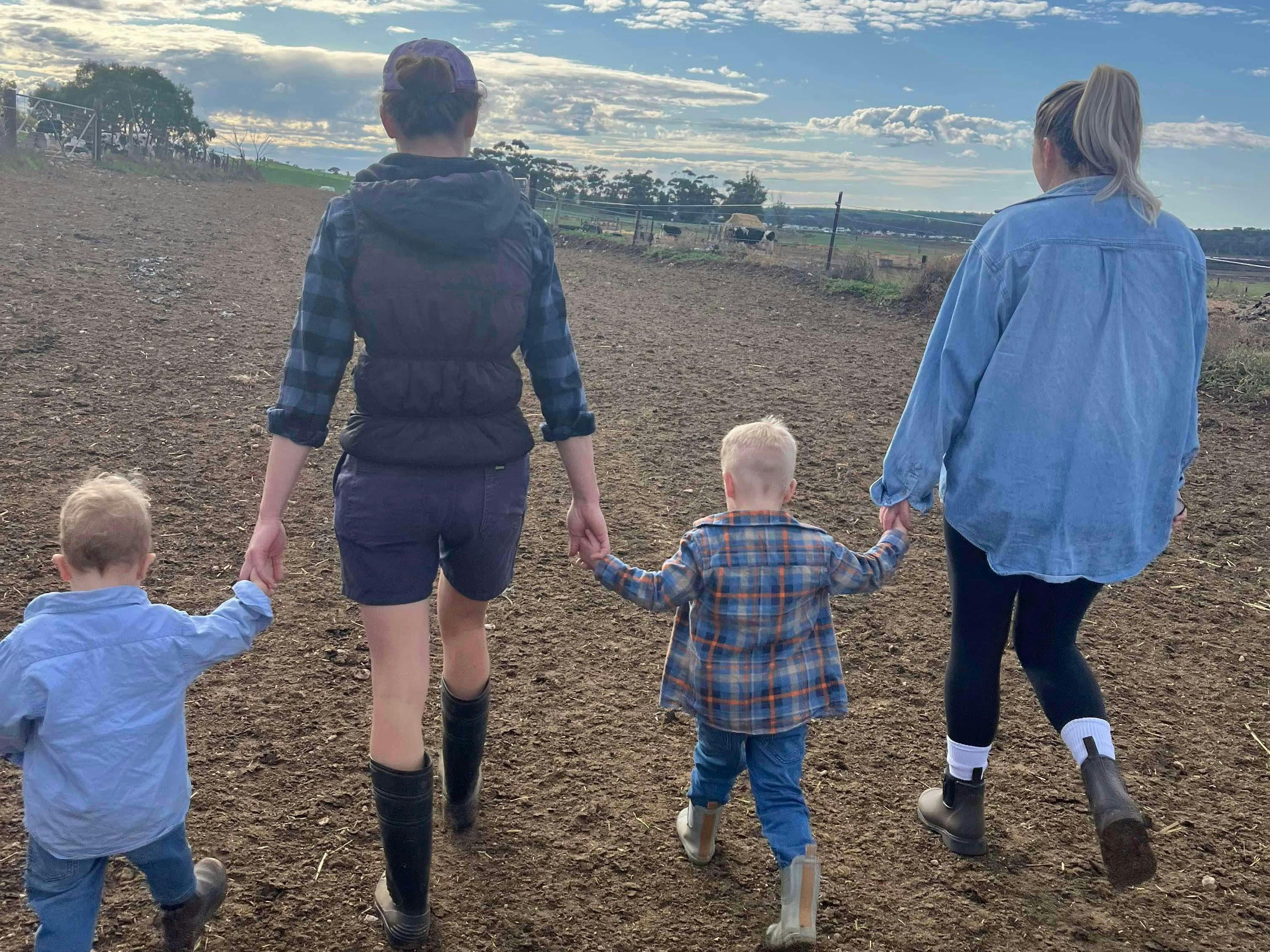 Family walking around the farm