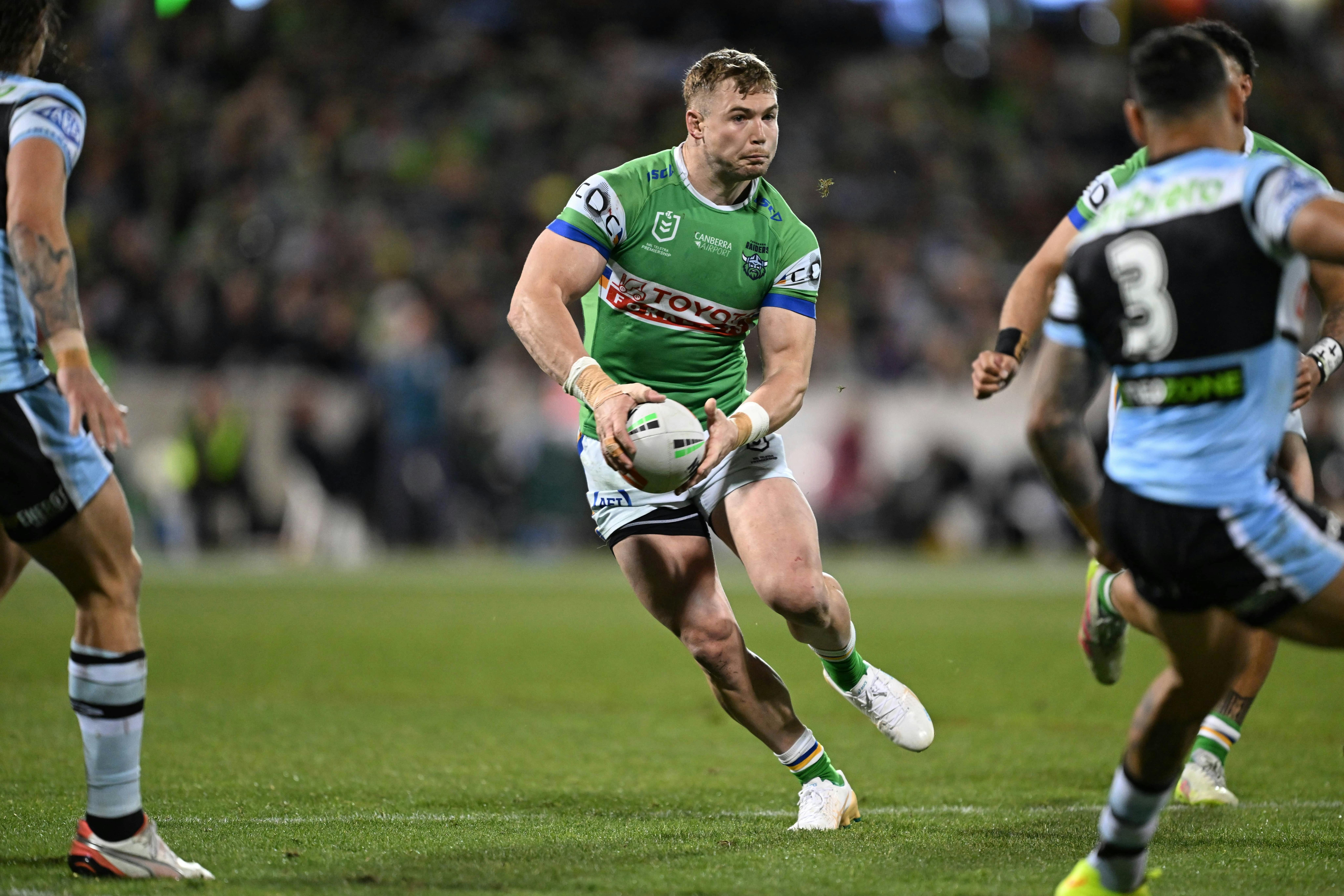 Canberra Raiders player Hudson Young running the ball.