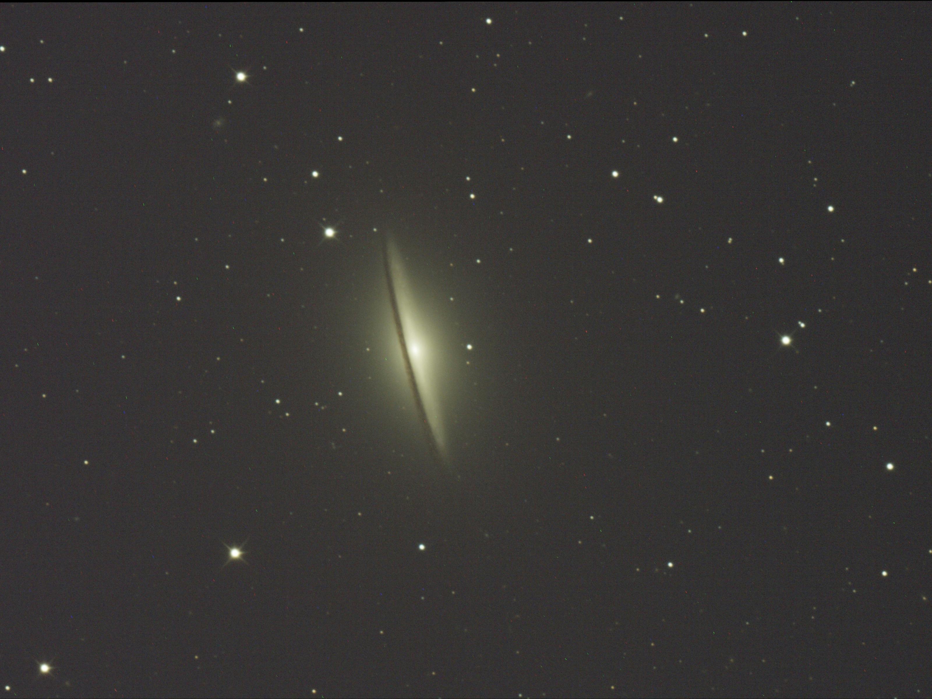 The striking dark dust lane of the Sombrero Galaxy (M104), captured directly via our telescope.