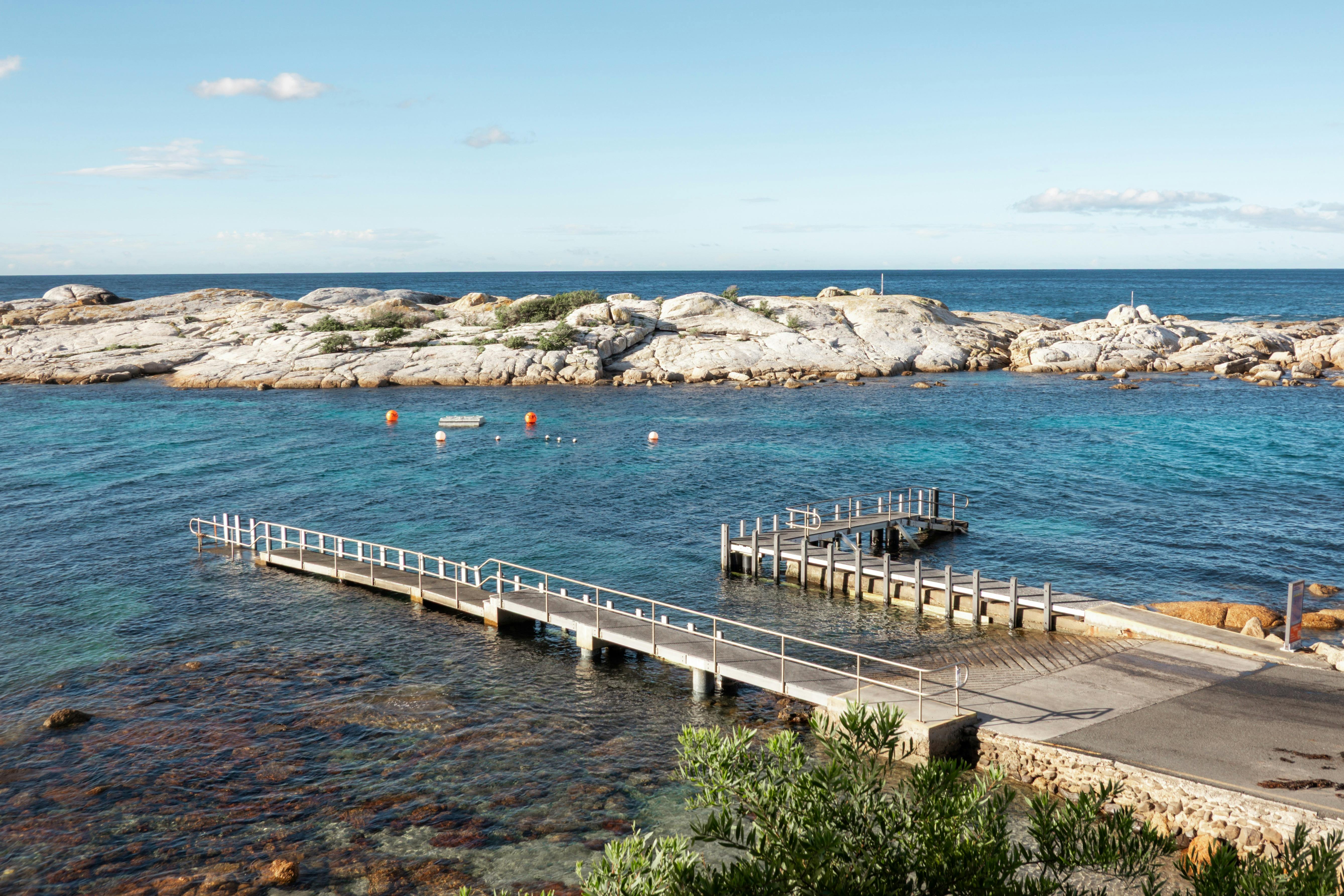 Photo showing the view from the Lobster Shack Tasmania deck including the boat ramp, Bicheno's Gulch