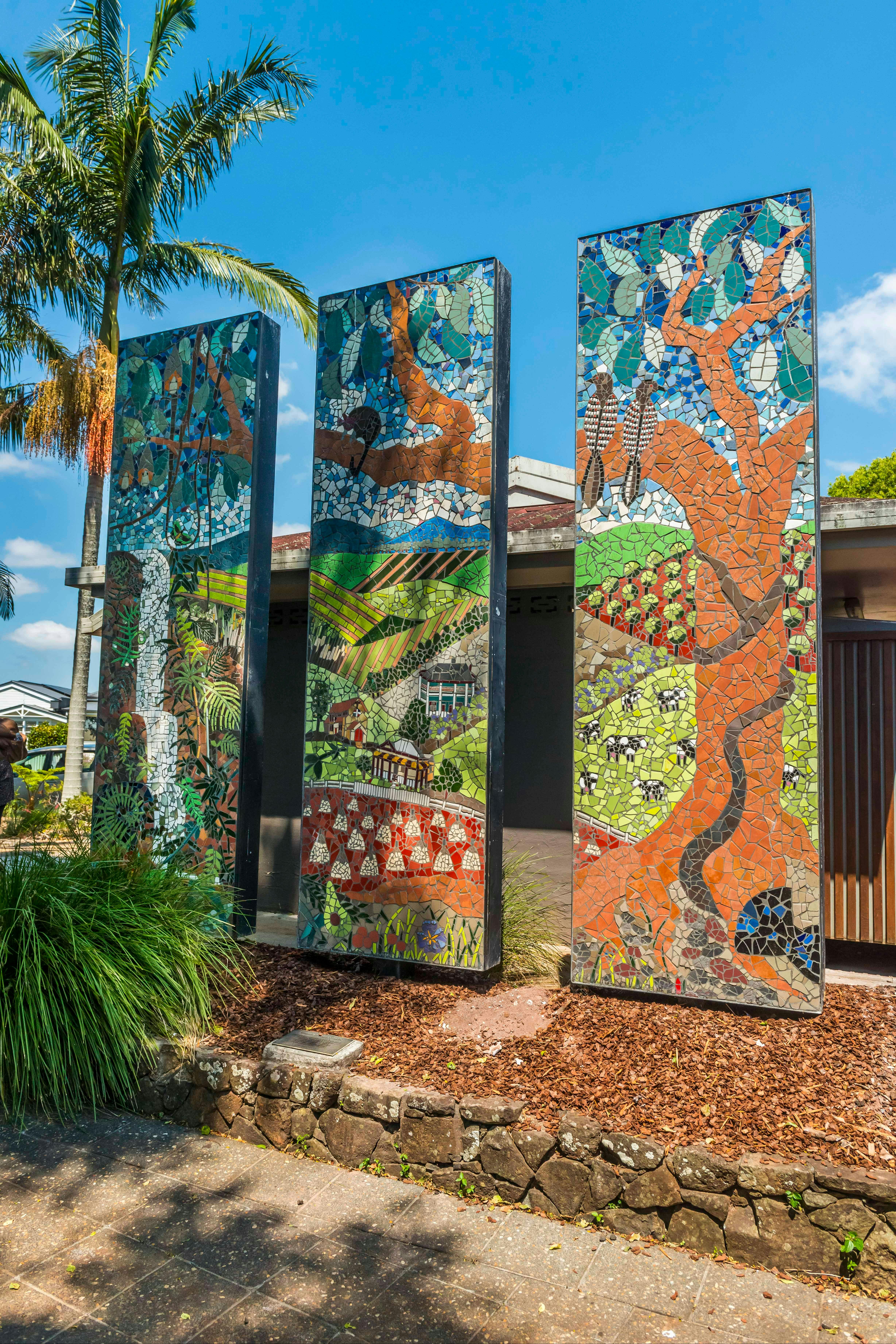 Three panels of mosaic tiles