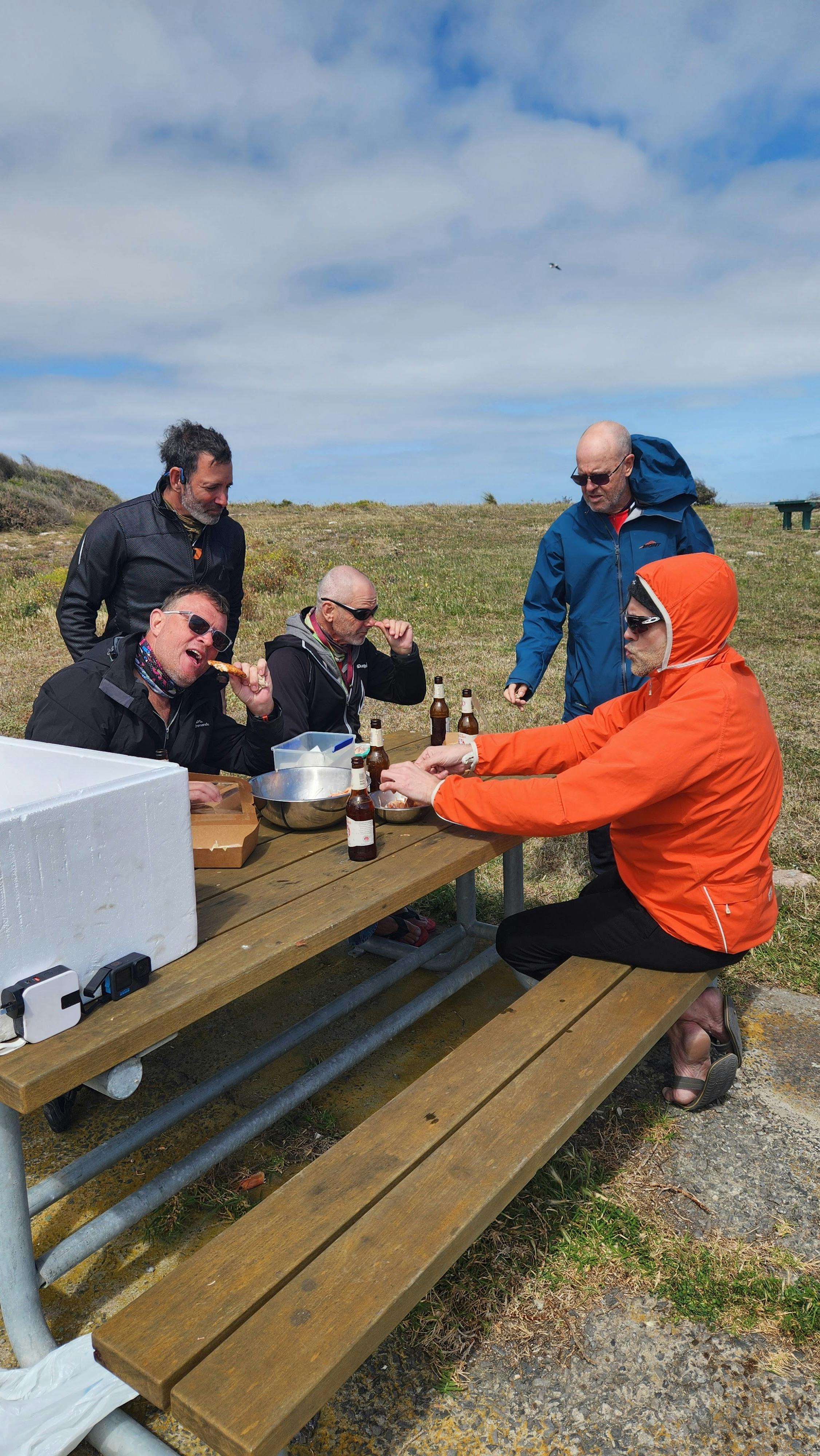 Coorong mullet burger, prawns, beer on the Coorong shoreline