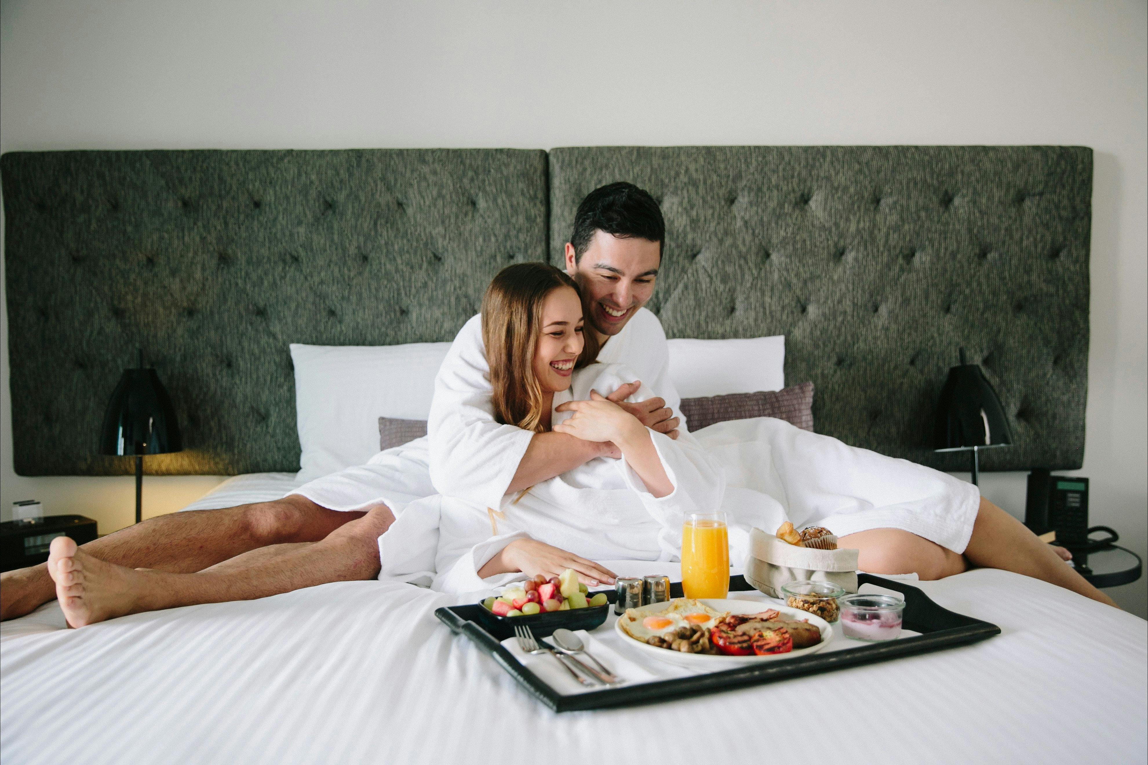 Couple relaxing with room service