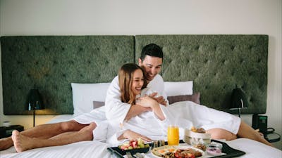 Couple relaxing with room service