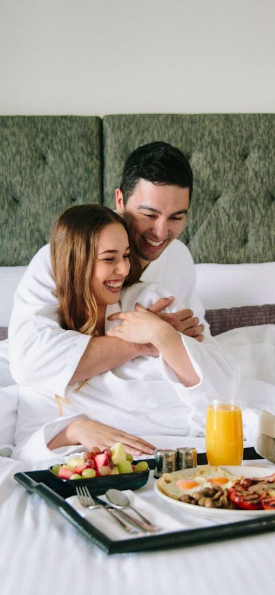 Couple relaxing with room service