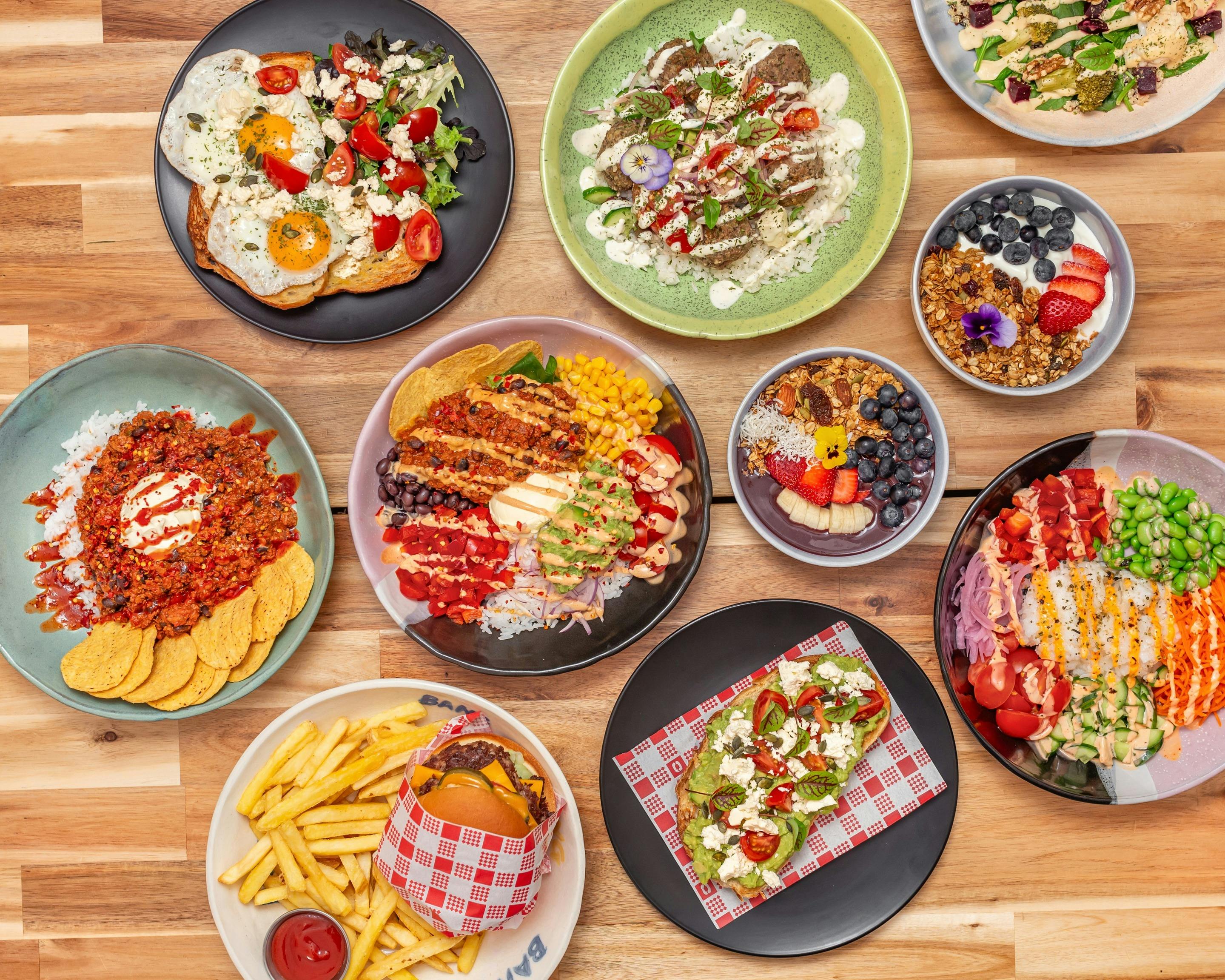 Food including Acai Bowl, Smashburger, Greek Meatballs, Poke Bowl & Mexican Burrito Bowl