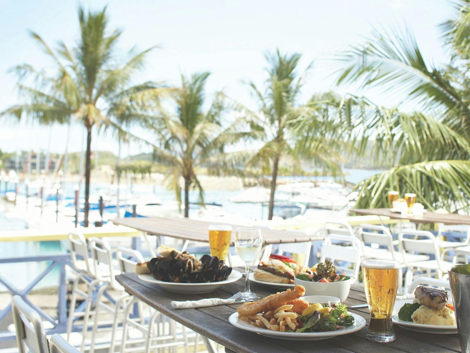 Food on a table overlooking the marina