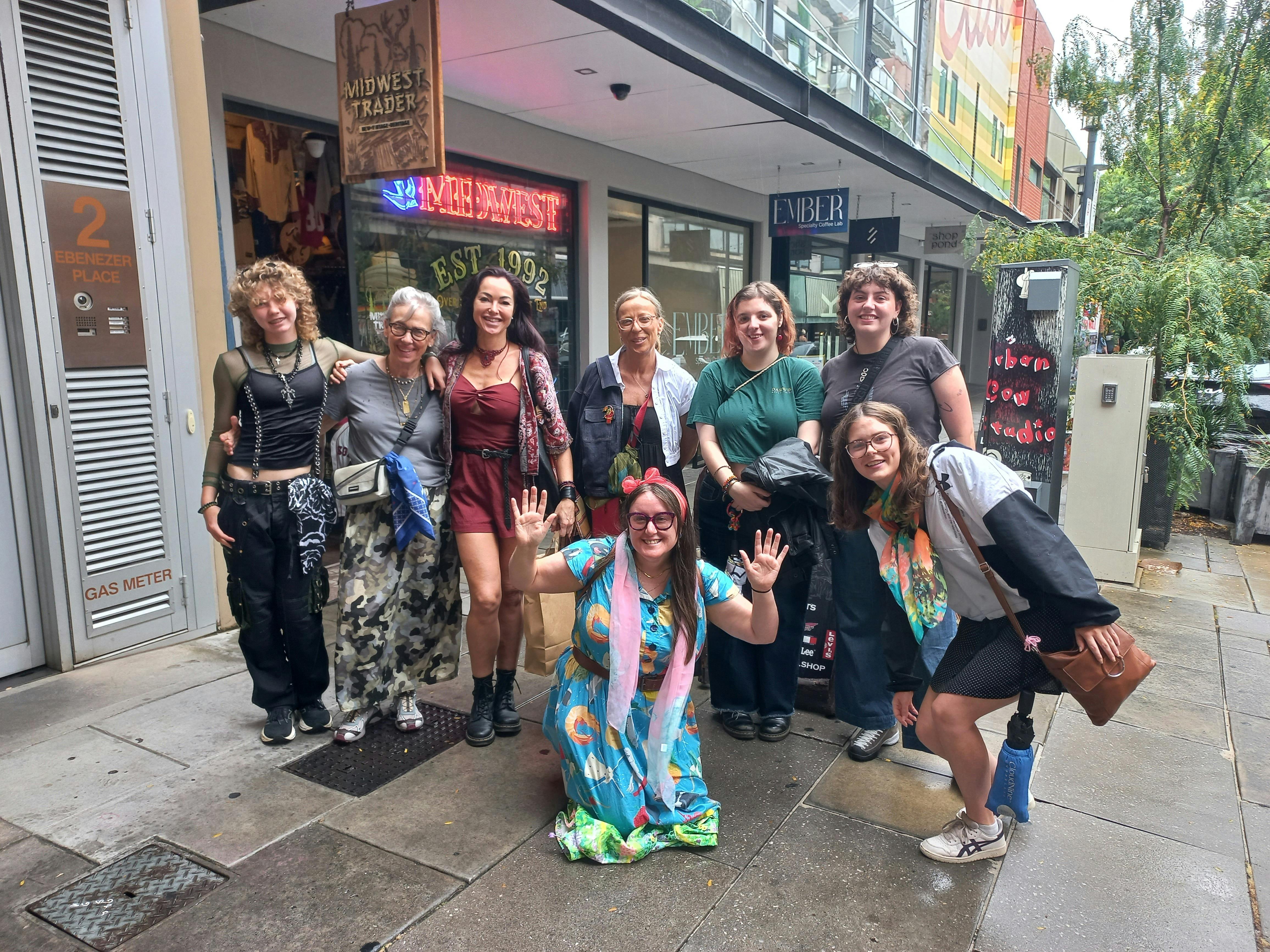 A tour group poses while on tour.