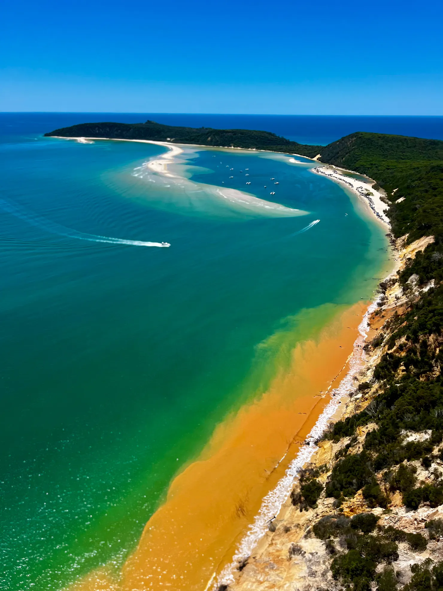 Coastline towards amazing Double Island Point from the famous coloured sands